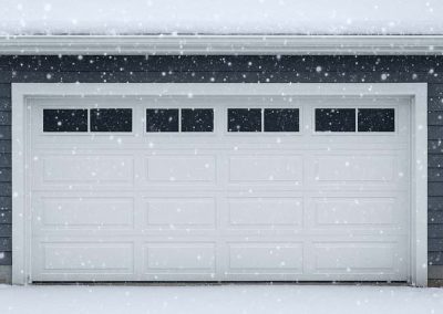 snowy suburbia garage in winter